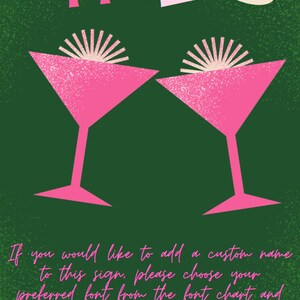 May include: A dark green sign featuring the word CHEERS in multi-colored letters at the top and two pink martini glasses with light pink garnishes in the center. The bottom text reads: If you would like to add a custom name to this sign, please choose your preferred font from the font chart and contact us.