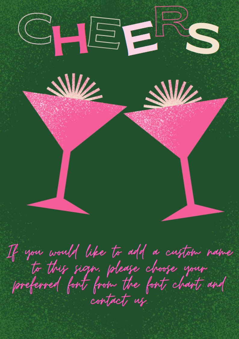 May include: A dark green sign featuring the word CHEERS in multi-colored letters at the top and two pink martini glasses with light pink garnishes in the center. The bottom text reads: If you would like to add a custom name to this sign, please choose your preferred font from the font chart and contact us.