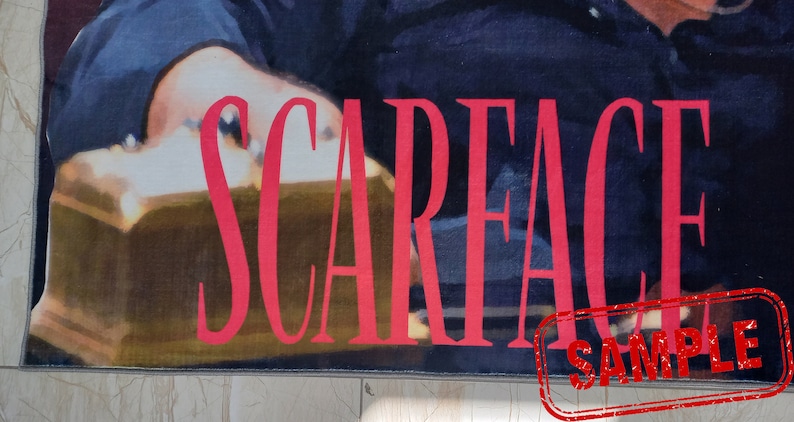 May include: A red and white poster with the word "SCARFACE" in large, bold, red letters. The poster is a sample.
