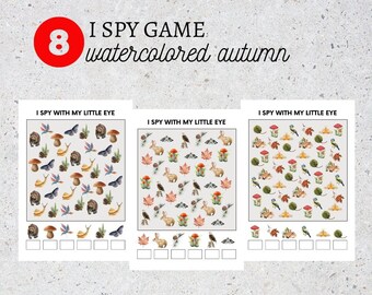 May include: Three printable I Spy game cards with an autumn theme. Each card features a grid of watercolor illustrations of various autumnal objects, such as mushrooms, leaves, birds, and squirrels. The text "I Spy With My Little Eye" is printed at the top of each card.