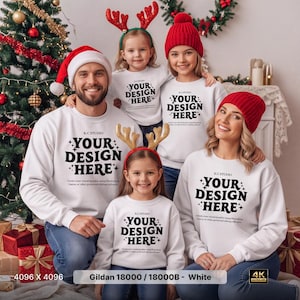 May include: A group of five people wearing matching white crewneck sweatshirts with the black text YOUR DESIGN HERE and K.C. STUDIO printed on the front. The sweatshirts feature long sleeves and a ribbed collar, cuffs, and hem in a white fabric.
