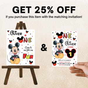 May include: Two Mickey Mouse-themed birthday party invitations. One invitation is on a small wooden easel. The invitations feature Mickey Mouse, the text "Oliver is One", and the words "Come in and join the fun".