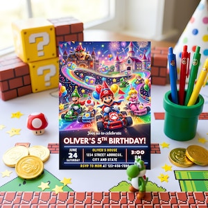 May include: A rectangular birthday invitation card featuring Mario Kart characters, a rainbow track, and a castle. Text includes: Join us to celebrate OLIVER'S 5TH BIRTHDAY! JUNE 24 SATURDAY, OLIVER'S HOUSE 1234 STREET ADDRESS, CITY AND STATE, 3:00 PM, RSVP TO MOM AT 123-456-7890.