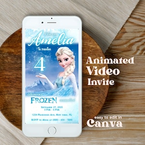 May include: A white smartphone displays a Frozen-themed birthday invitation for Amelia's 4th birthday. The invitation features Elsa, the text "Frozen Celebration," and event details. The phone rests on a wooden surface with the text "Animated Video Invite."