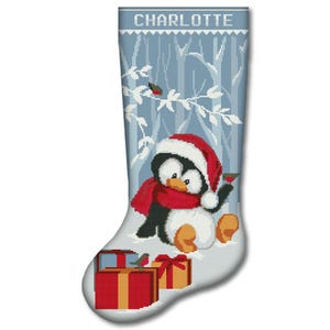 May include: A Christmas stocking featuring a penguin wearing a red scarf and Santa hat, with the name "CHARLOTTE" at the top. The stocking has a winter forest scene background and presents at the bottom.