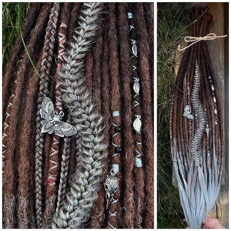 May include: Brown and gray synthetic dreadlocks with silver butterfly and skull charms. The dreadlocks are decorated with copper wire, white string, and black beads.