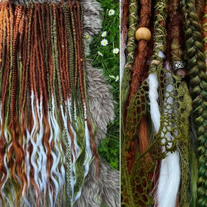 May include: A close-up of handmade dreadlocks in shades of brown, green, and white. The dreads are styled with braids, wraps, and decorative elements. The background is a faux fur surface with a few daisies.
