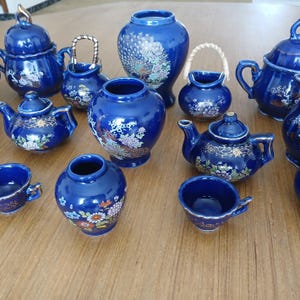 Set of 17 mini plates and cups and sugar bowl decorative in vintage porcelain peacock blue Moroccan ceramic taous.original chinese porcelain