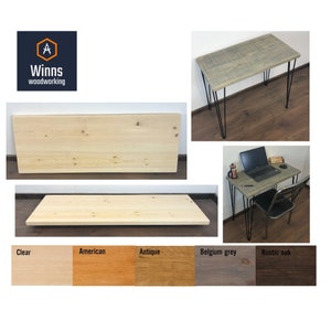May include: A wooden desk with hairpin legs in various wood finishes, including clear, American, antique, Belgium grey, and rustic oak. The desk is shown with a laptop and a cup of coffee on top.