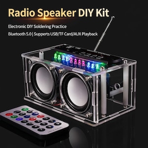 May include: A clear acrylic Radio Speaker DIY Kit with two speakers, a remote, and an antenna. The kit includes a control panel with colorful LED lights. Text on the image reads: "Radio Speaker DIY Kit" and "Electronic DIY Soldering Practice".