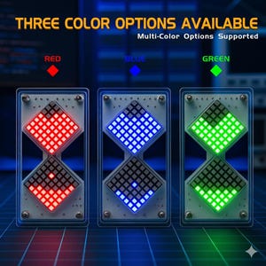 Op de afbeelding: De afbeelding toont drie elektronische apparaten met de tekst 'THREE COLOR OPTIONS AVAILABLE'. Elk apparaat heeft twee ruitvormige displays, die oplichten in rood, blauw en groen. De tekst 'Multi-Color Options Supported' is ook zichtbaar. De apparaten zitten in een transparant frame.