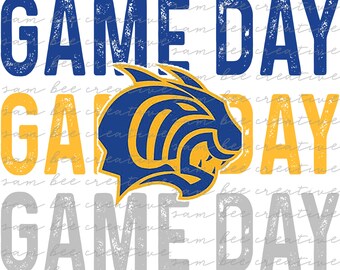 Puede incluir: Un diseño gráfico con el texto "GAME DAY" en letras azules y amarillas con un aspecto desgastado. Una cabeza de mascota azul y amarilla está en el centro del diseño.