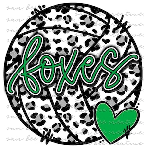 May include: A black and white volleyball with a leopard print design. The word "Foxes" is written in green on the volleyball. A green heart is in the lower right corner of the image.