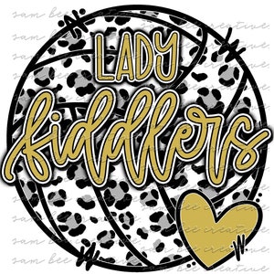 Może przedstawiać: Czarno-biała piłka do siatkówki z wzorem lamparta. Słowa "LADY FIDDLERS" są napisane złotem na piłce do siatkówki. Złote serce znajduje się w prawym dolnym rogu obrazu.