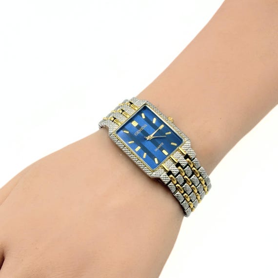 DOUBLE SIGNED Geneva オークションカタログ Vintage Geneva Classic Collection His and Hers Watch Set, Metallic
