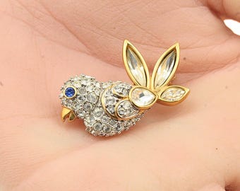 スワロフスキークリスタルをちりばめた鳥の青い目のブローチ - Etsy 日本