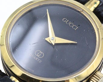 Gucci Black Embossed Leather Dial Watch with Gold-Tone Case retail $1060 Gucci G-Timeless 38mm Signature Black Leather Watch  main image 3