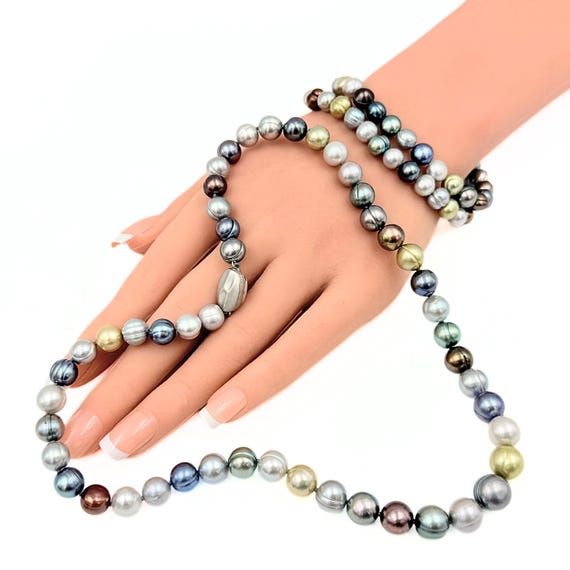 Braccale n perle d vetro e metallo argentato. Solo 13 euro. Se