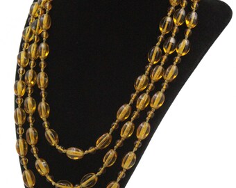 Antieke art-deco handgeknoopte gele glazen flapketting