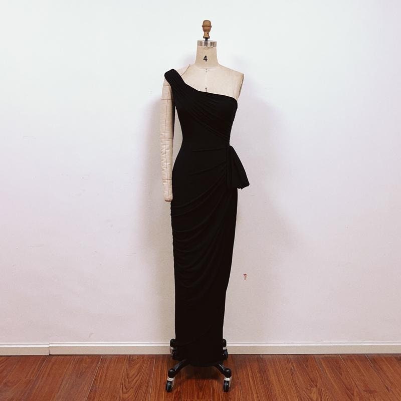 one shoulder dress history Marilyn 1950s Black One-shoulder Dress