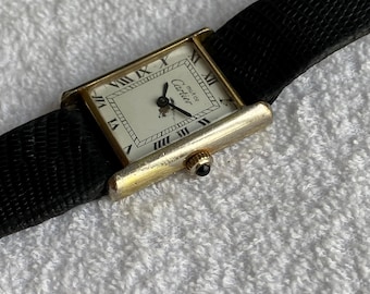 Relógio Vintage Must de Cartier Tank 24 mm | Banhado a Ouro, Corda Manual, Mostrador com Algarismos Romanos