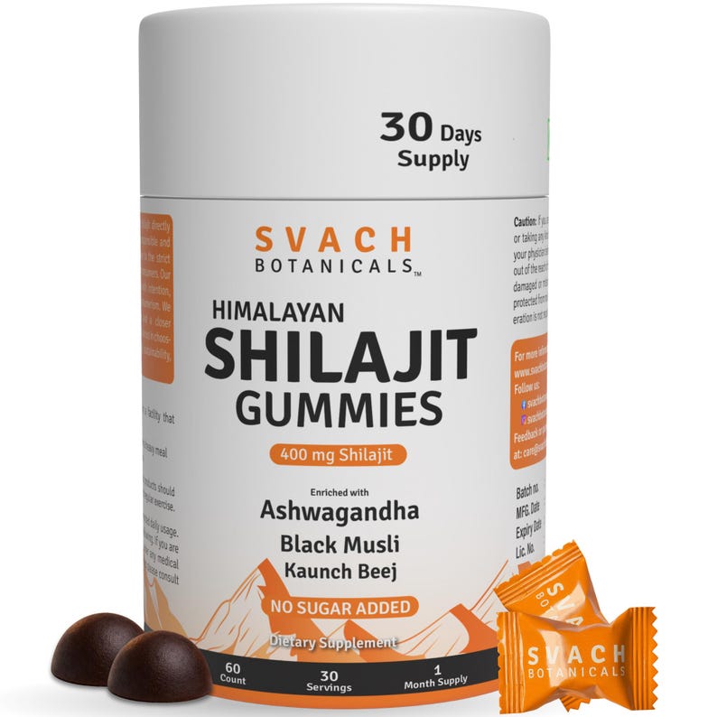 May include: A white cylindrical container of Svach Botanicals Himalayan Shilajit Gummies. The label highlights the product's key ingredients, including Ashwagandha and Black Musli. Two dark brown gummies and two orange individual packets are also visible.