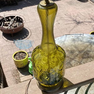 May include: A set of three ceramic mugs with a speckled, matte finish. Each mug features a different color: light blue, cream, and gray. The mugs have a simple, modern design and a comfortable handle.