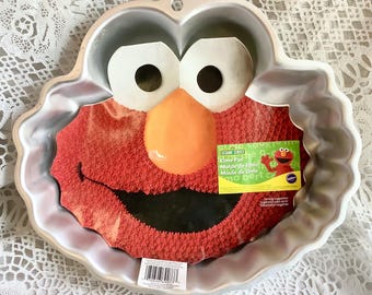 Teglia da forno in alluminio Wilton a forma di pupazzo di Elmo di Sesame Street