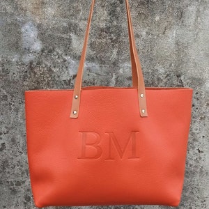 Monogrammed leather bag with initials BM