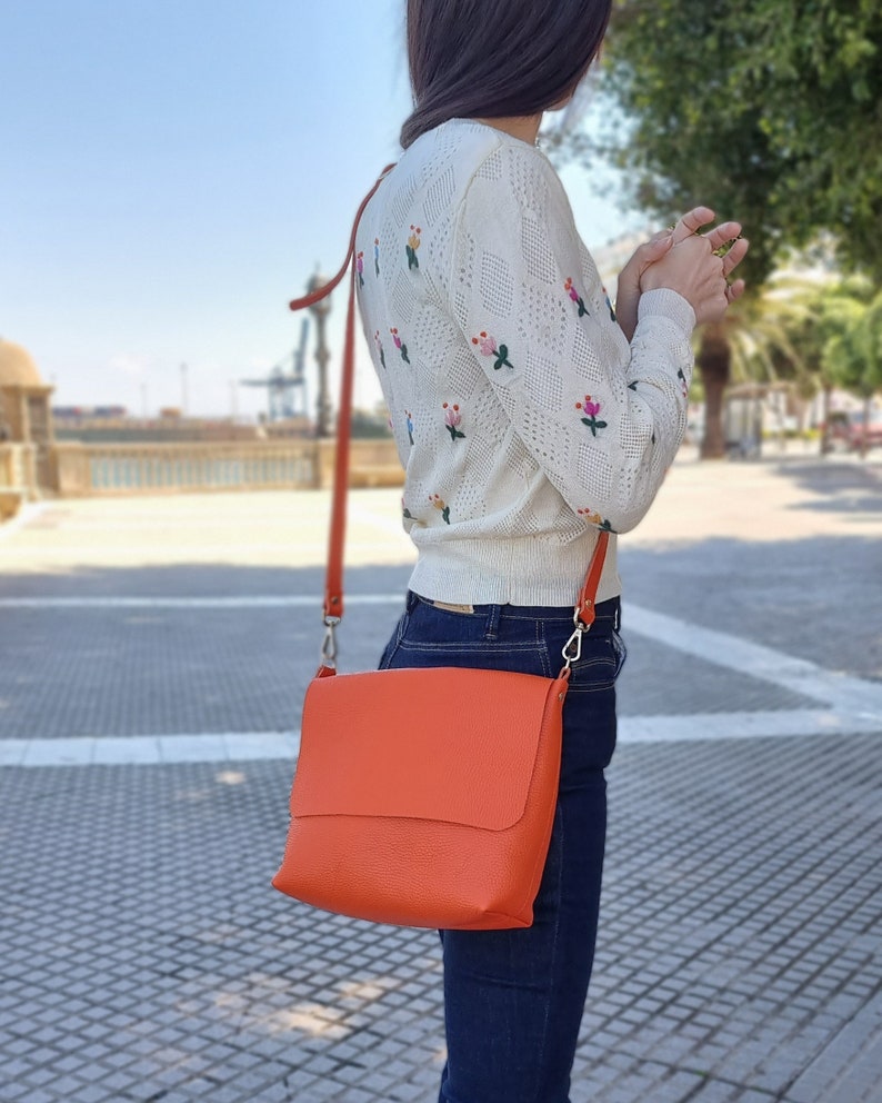 orange leather crossbody bag perfect for more daring people