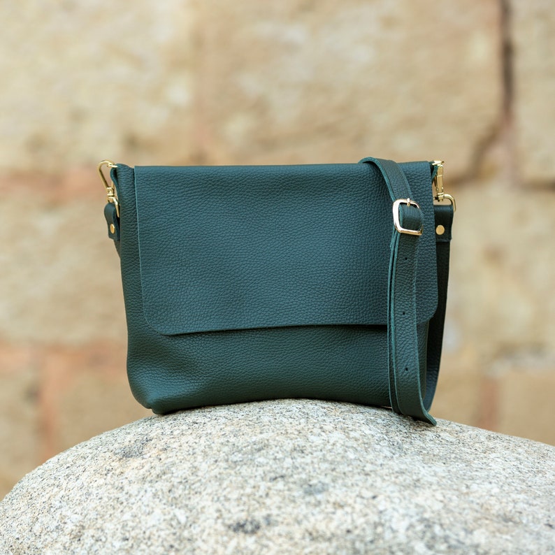 dark green leather crossbody bag.
