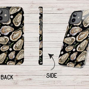 May include: A black phone case with a pattern of oyster shells and pearls. The case is shown from the back and side.