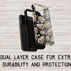 May include: A black phone case with a dual layer design. The case has a clear back with a pattern of white oysters on a black background. The text "DUAL LAYER CASE FOR EXTRA DURABILITY AND PROTECTION" is printed below the case.