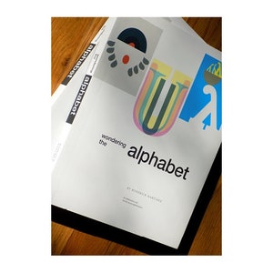 Zastanawiając się nad książką alfabetu - sztuka/poezja/historia typografii