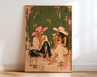 May include: A framed wall art print depicting two figures sitting against a textured olive green and pink background. One figure wears a bright pink wide-brimmed hat and white shirt, while the other wears a beige hat and holds a green cocktail.