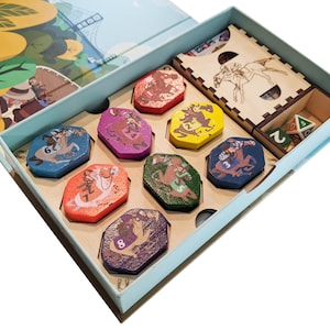 May include: A wooden box with a blue lid, containing eight colorful hexagonal game pieces with horses and numbers, a wooden stand with a horse illustration, and two dice.