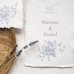 May include: Wedding invitation with blue floral illustrations and the text "With horse full of joy me invite you to THE WEDDING OF Martina & Daniel"