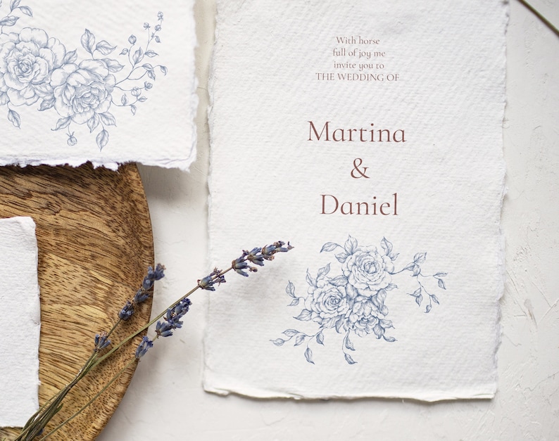 May include: Wedding invitation with blue floral illustrations and the text "With horse full of joy me invite you to THE WEDDING OF Martina & Daniel"