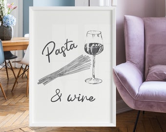 Puede incluir: Una impresión enmarcada en blanco con el texto "Pasta & wine" en letras negras. Una ilustración en blanco y negro de una copa de vino tinto y un manojo de espaguetis está por encima del texto. La impresión está colgada en una pared azul claro en una habitación con un sillón rosa.