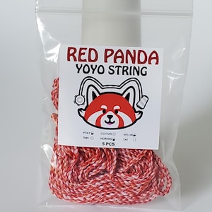 May include: A clear plastic bag containing five pieces of red and white twisted yoyo string. The label features a red panda illustration and the text RED PANDA YOYO STRING, with checkboxes indicating poly and normal thickness for the 5 PCS set.
