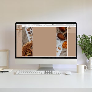 以下が含まれることがあります： デスクトップコンピュータは、キノコのイラストと編まれたバスケットを備えたデザインレイアウトを表示します。画面は、キーボード、マウス、コーヒーマグのある白い机の上にあります。額入りの写真と緑の入った花瓶も机の上にあります。