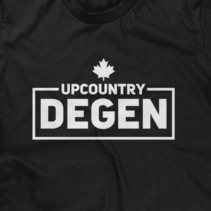 May include: Black t-shirt with a white maple leaf and the text "UPCOUNTRY DEGEN" in a white rectangle.
