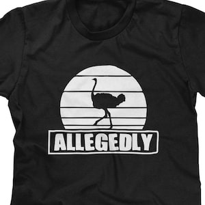 May include: Black t-shirt with a white graphic of an ostrich in front of a sunset with the text "ALLEGEDLY" underneath.
