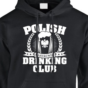 May include: Black hooded sweatshirt with a white graphic design that says "Polish Drinking Club" with a beer glass and the Polish eagle inside the glass. The text "Na Zdrowie" is inside the glass.