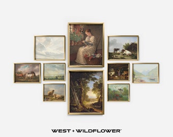 May include: A collection of framed paintings in gold frames, featuring various landscapes, animals, and a woman reading a book. The paintings are arranged in a symmetrical pattern on a white wall. The text "WEST + WILDFLOWER" is printed below the paintings.