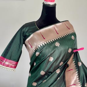 Dark Green color muniya border lotus pallu paithani semi silk saree with  stitched blouse