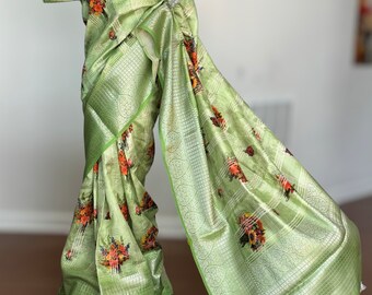 Mint green Banarasi pure silk saree with stitched blouse