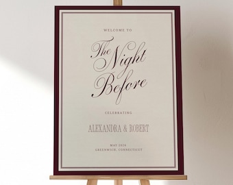 May include: A rectangular welcome sign on a wooden easel featuring a cream background with a dark burgundy border. The text reads: WELCOME TO The Night Before CELEBRATING ALEXANDRA & ROBERT MAY 2026 GREENWICH, CONNECTICUT in dark burgundy script and serif fonts.