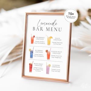 May include: A framed lemonade bar menu sign with a rose gold border. The white sign features black text and six watercolor illustrations of lemonade drinks: strawberry, peach, blueberry, passion fruit, mixed berry, and lavender. Includes a 15+ bonus drink elements badge.