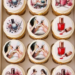 May include: A box of twelve cupcakes, each decorated with a nail art theme. Some have images of nail polish bottles, others show manicures, and some have floral designs. The cupcakes are topped with white icing.